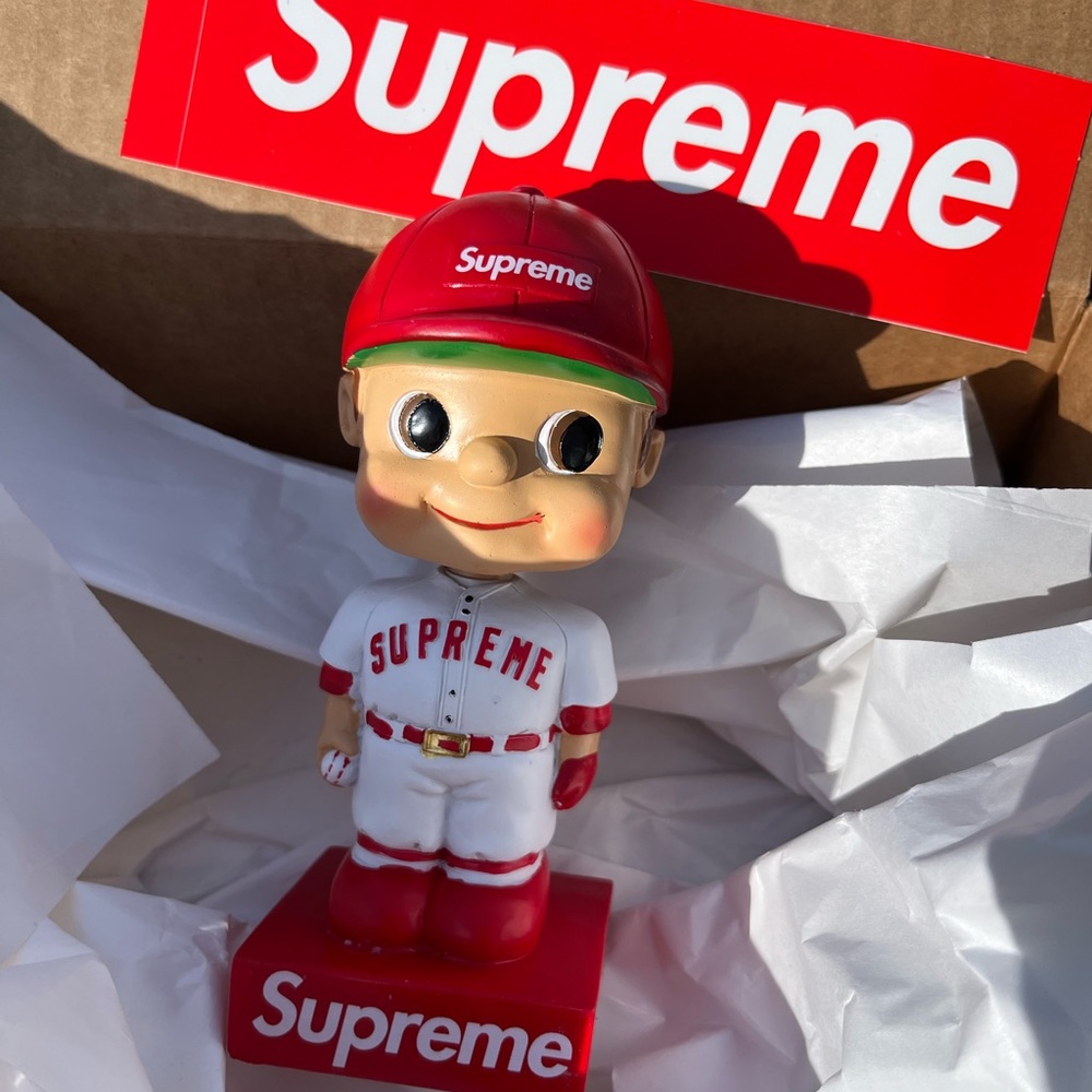 Supreme Bobblehead Red